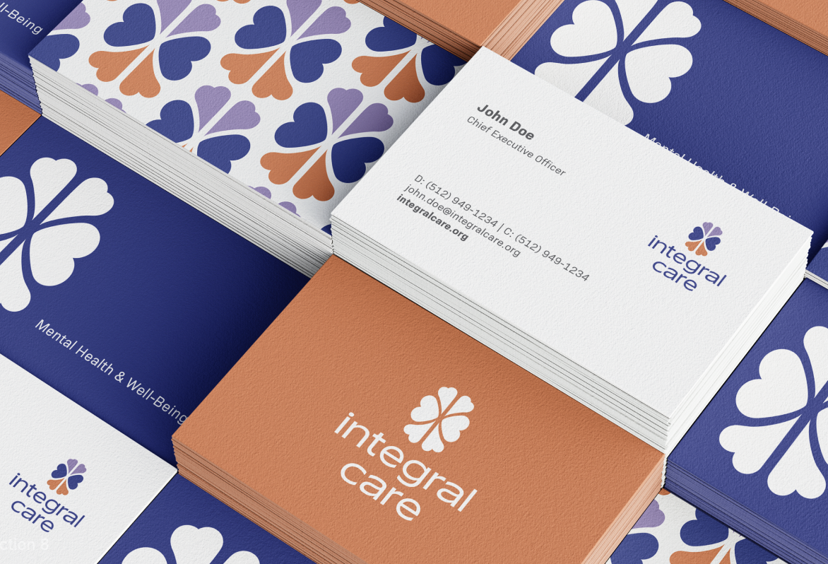 Integral Care business cards and brand pattern in indigo, purple, and orange