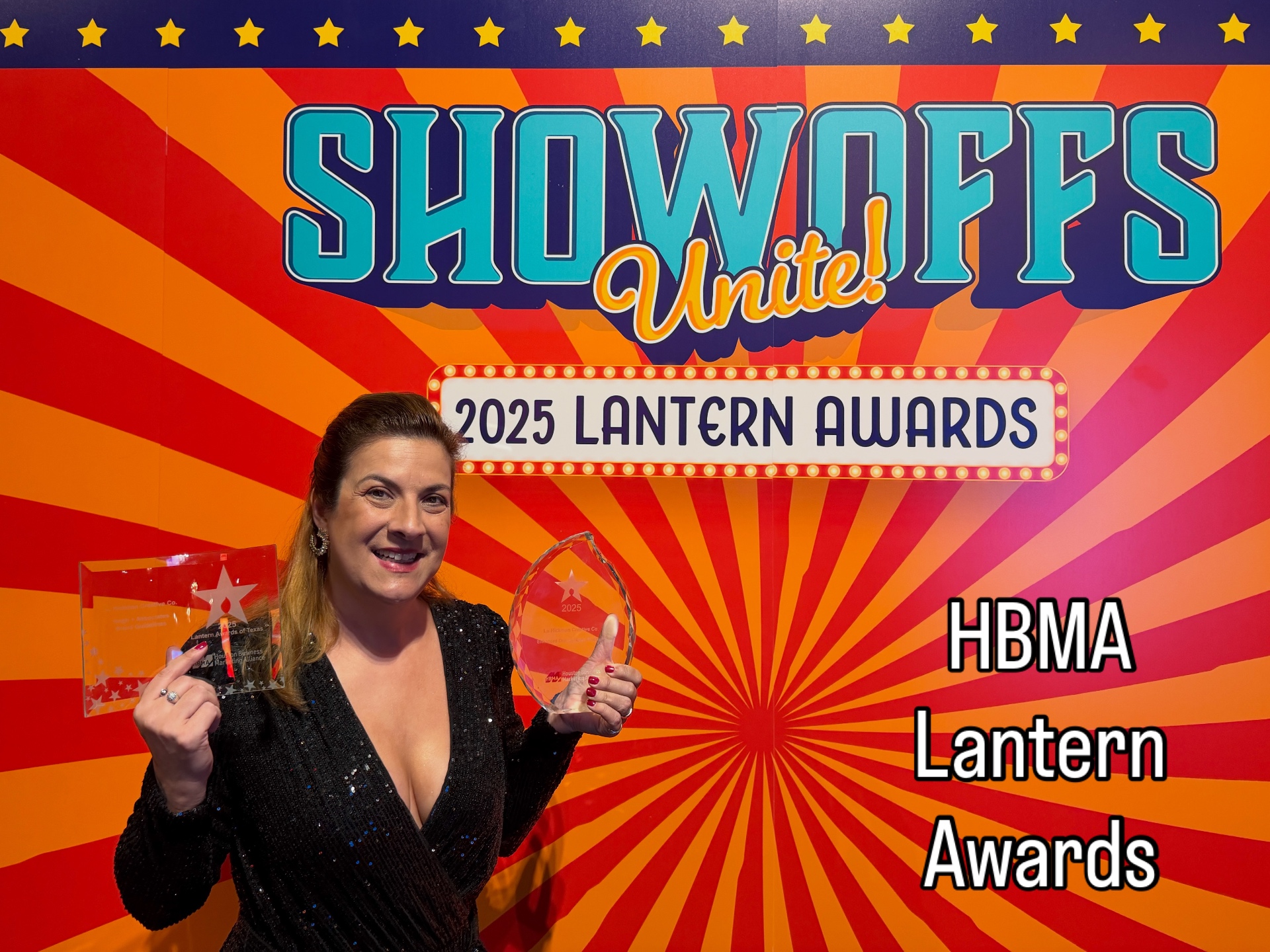 Lu Hickman holding the 2025 HBMA Lantern and Excellence Awards at the Showoffs Unite event